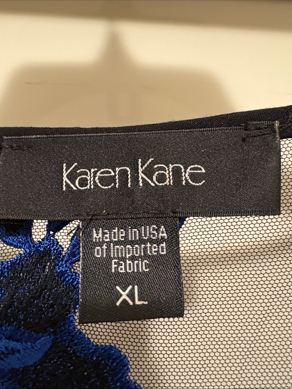 Karen Kane Black Sheer Top with Royal Blue Floral Embroidery - Picture 2 of 3